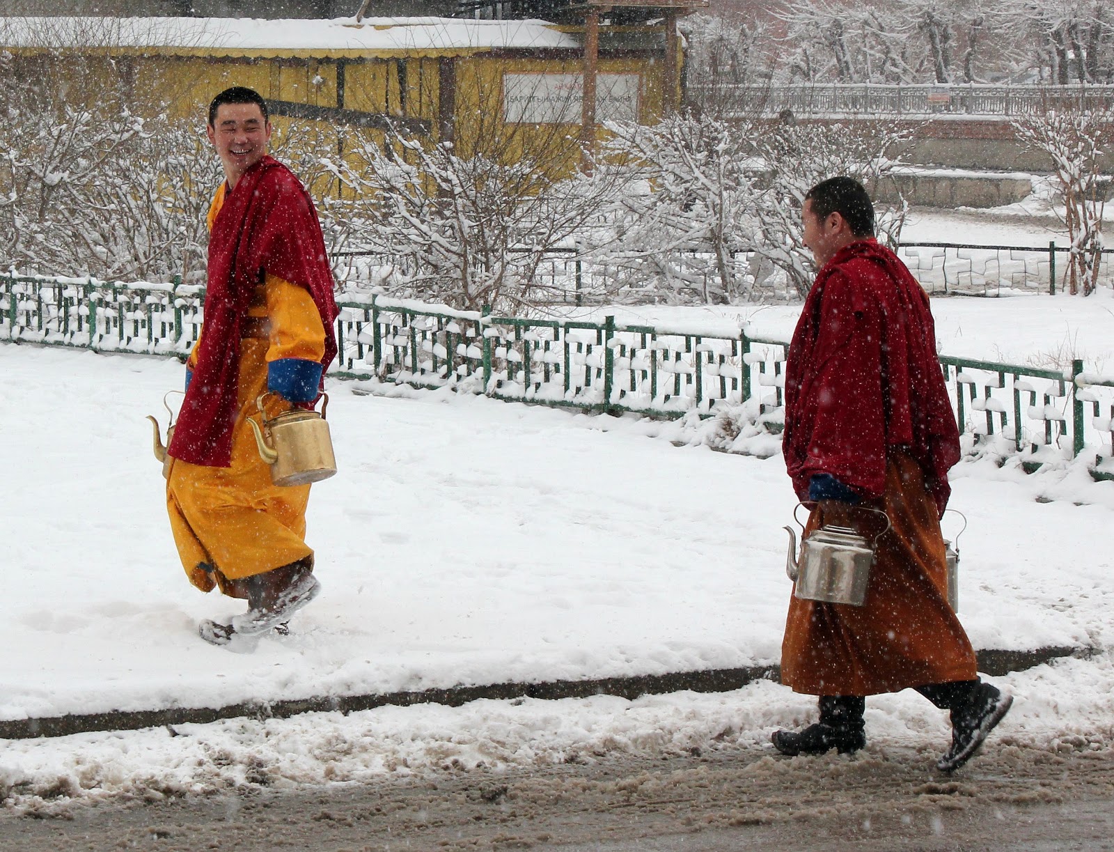 Two happy monks Gandan monastery, things to do in UB in winter